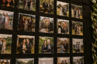 Wall display of custom photo magnets at a Central Florida event